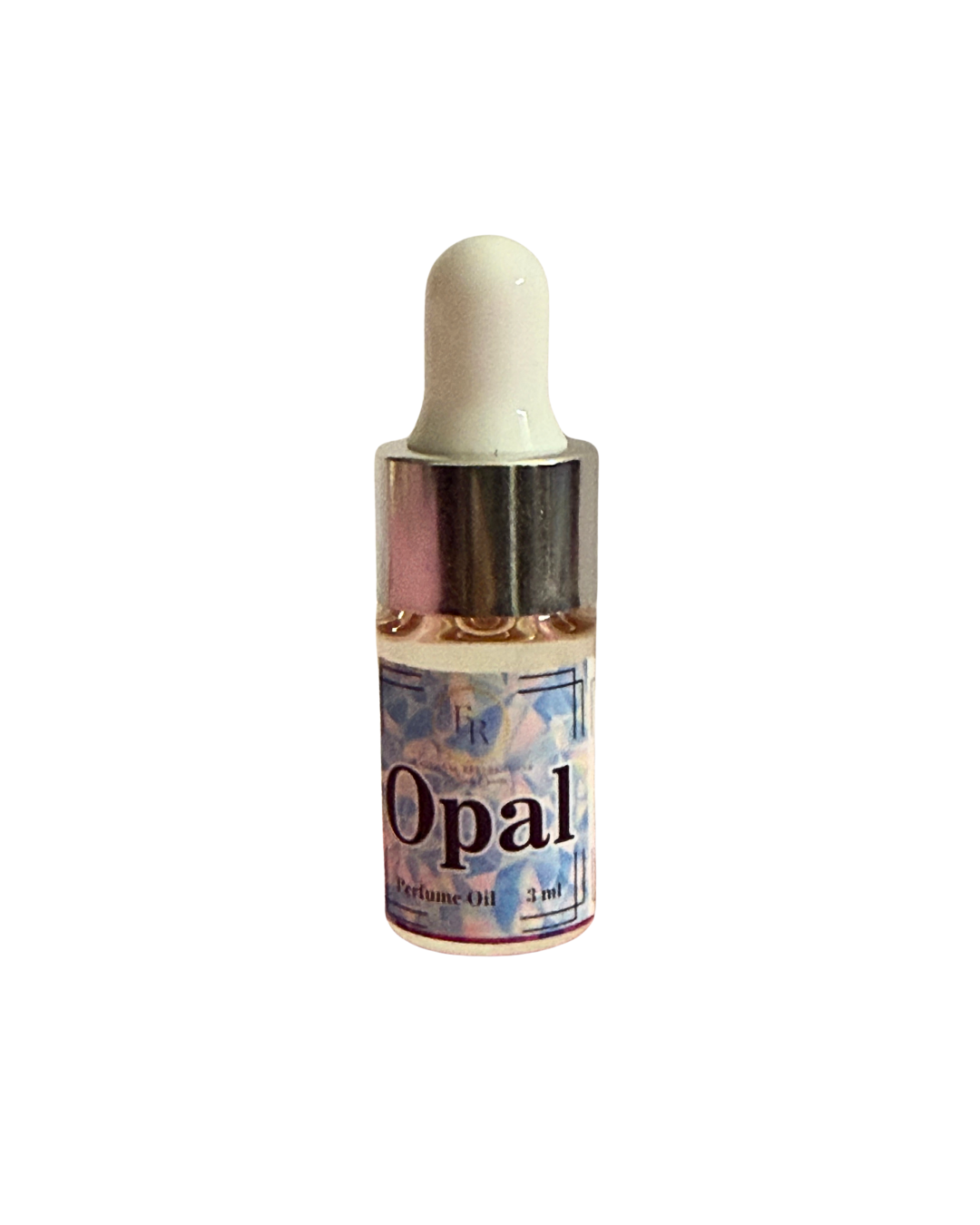 Close up of External Reflections trial size Opal perfume oil dropper bottle showing label.