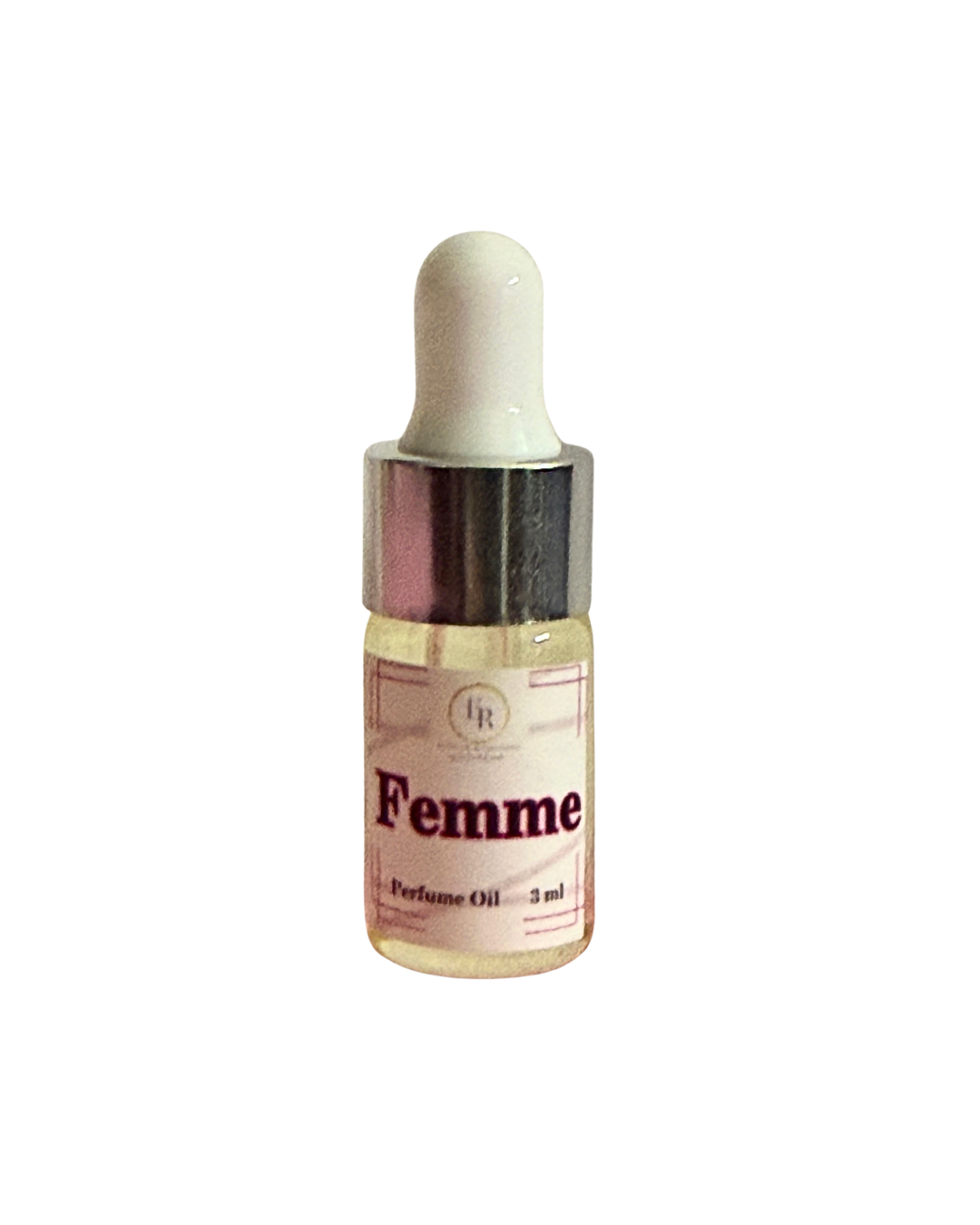 Close up of External Reflections trial size Femme perfume oil dropper bottle showing label.