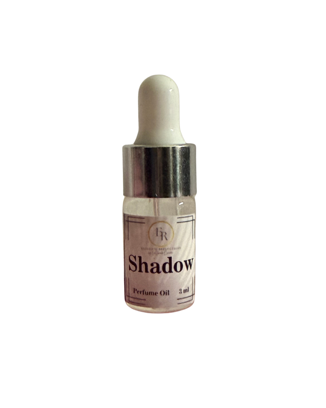 Close up of External Reflections trial size Shadow perfume oil dropper bottle showing label.