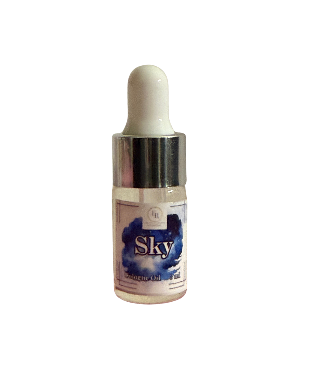 Close up of External Reflections trial size Sky cologne oil dropper bottle showing label.